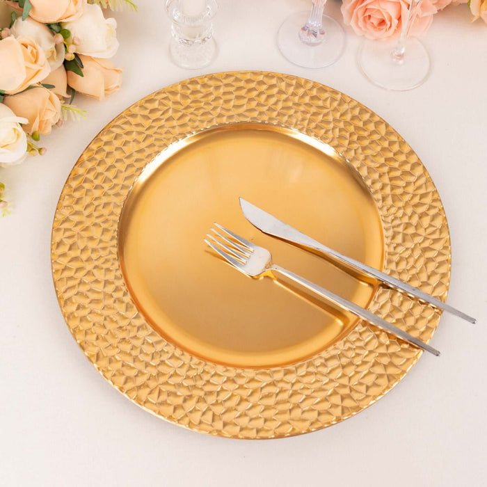 Gold decorative plate with knife and fork, surrounded by flowers.