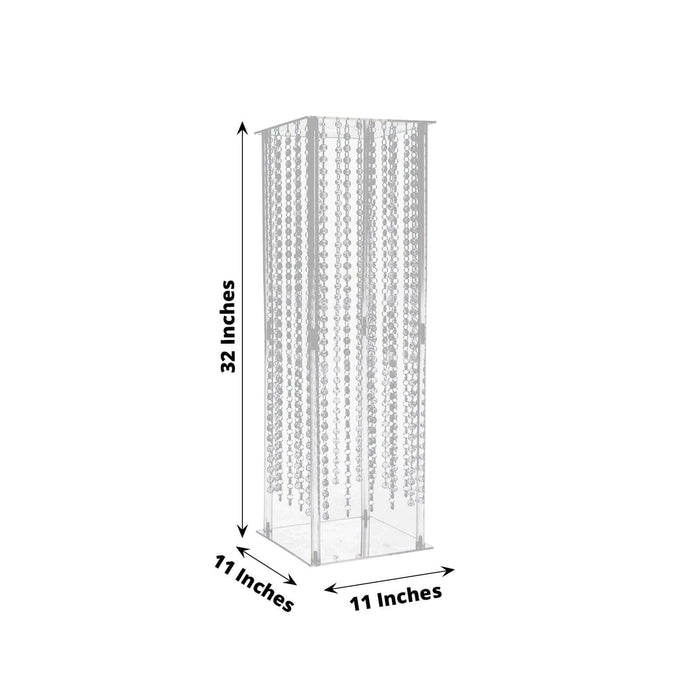 Clear acrylic display tower with dimensions 32x11x11 inches.
