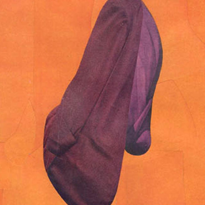 Close-up of an abstract print with a dark purple flowing shape against a textured orange background