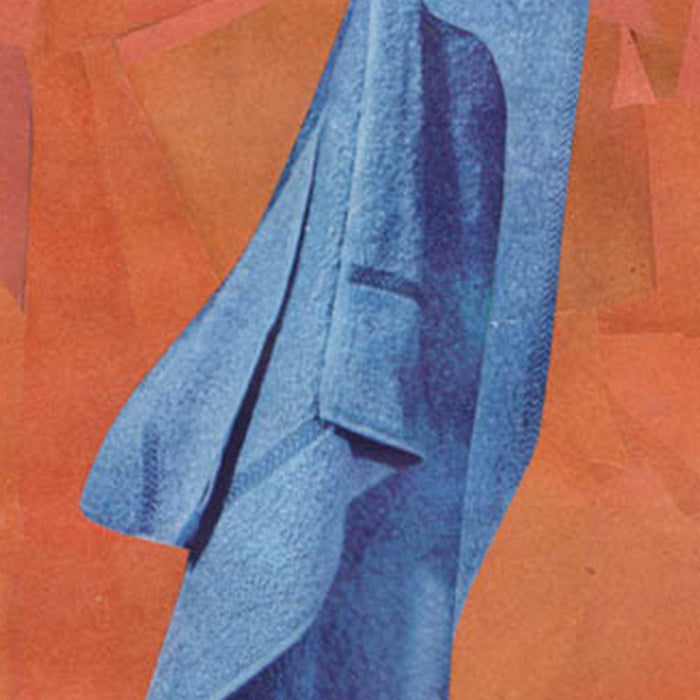 Close-up of a print with a textured blue fabric form draped over subtle orange and pink geometric shapes