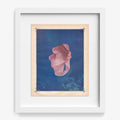 Abstract art print Color Play 141 in a white frame featuring a pink amorphous shape on a blue background