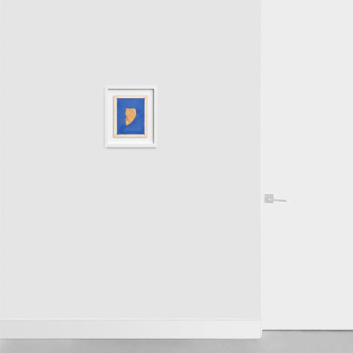 Michael DeSutters Color Play 143 print featuring a golden fabric draped on a blue background framed in white on a white