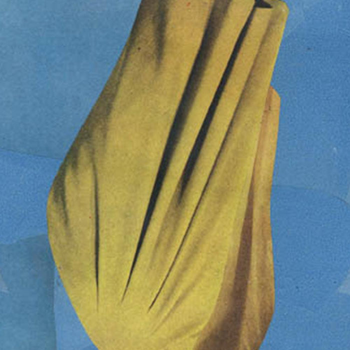 Close-up of Color Play 144 print showing a crumpled yellow textile shape on a light blue background