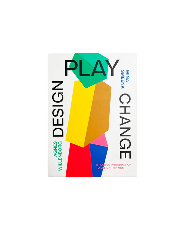 The book cover of 'Play Change: Design for Innovation Thinking' by Agnes Willenberg and Wina Smeenk, featuring a white background with bold black typography and a colorful geometric design of stacked 3D shapes in green, yellow, orange, pink, and red.