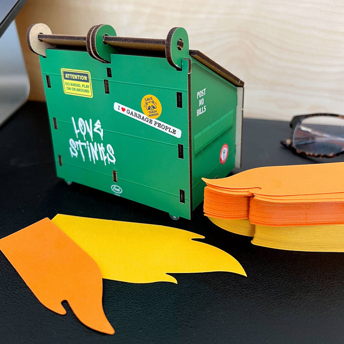 Back view of the Desk Dumpster mini organizer with bright flame notes — funny office gift for holiday or white elephant exchanges.