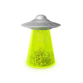 UFO-themed paperclip holder with glowing green base and cow-shaped clips — funny desk accessory and gift