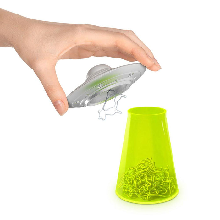 UFO desk organizer with neon acrylic base holding cow paperclips — quirky gift for coworkers or students