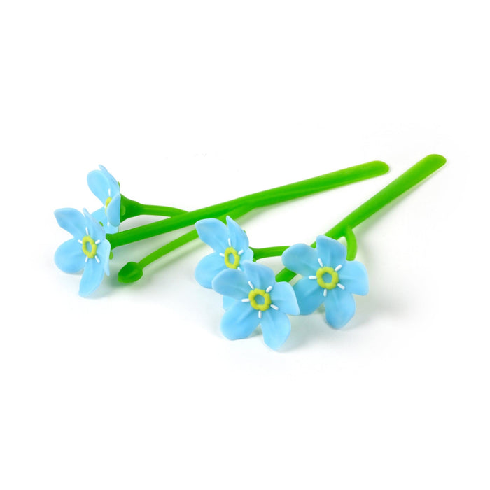 A bookmark with three blue flowers with green stems on a white background