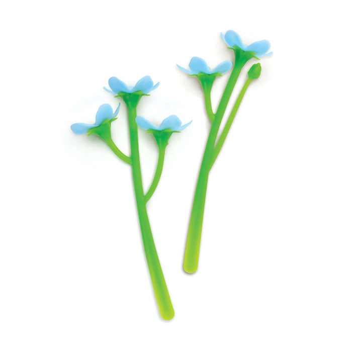 Two green flower-shaped bookmarks  with blue petals on a white background