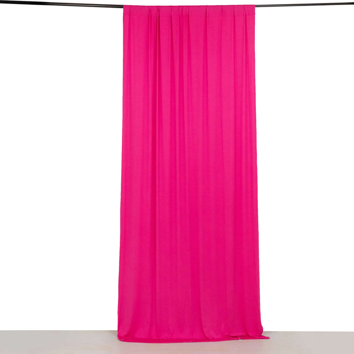 Pink fabric curtain draping elegantly on a rod against a white background