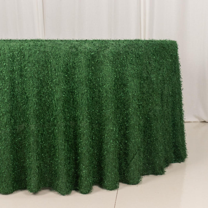 Green grass tablecloth on a plain backdrop, ideal for events and decorations.