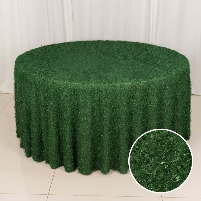Green grass tablecloth on a round table with close-up detail inset.