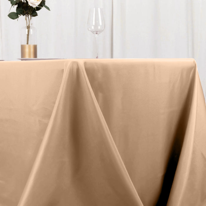 Beige tablecloth draped elegantly over a table in a dining setting.