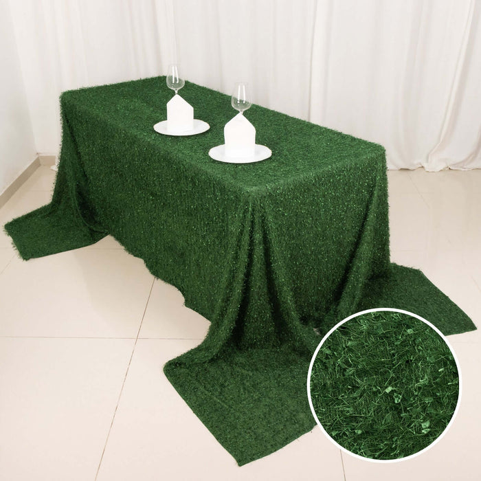 Green grass tablecloth with smooth texture, perfect for outdoor events.