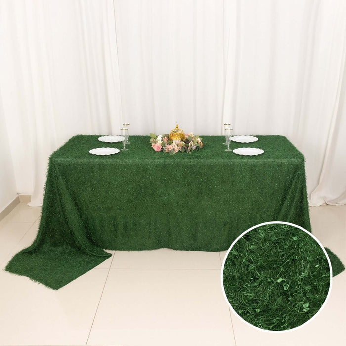 Green artificial grass table cover with elegant decoration and plates