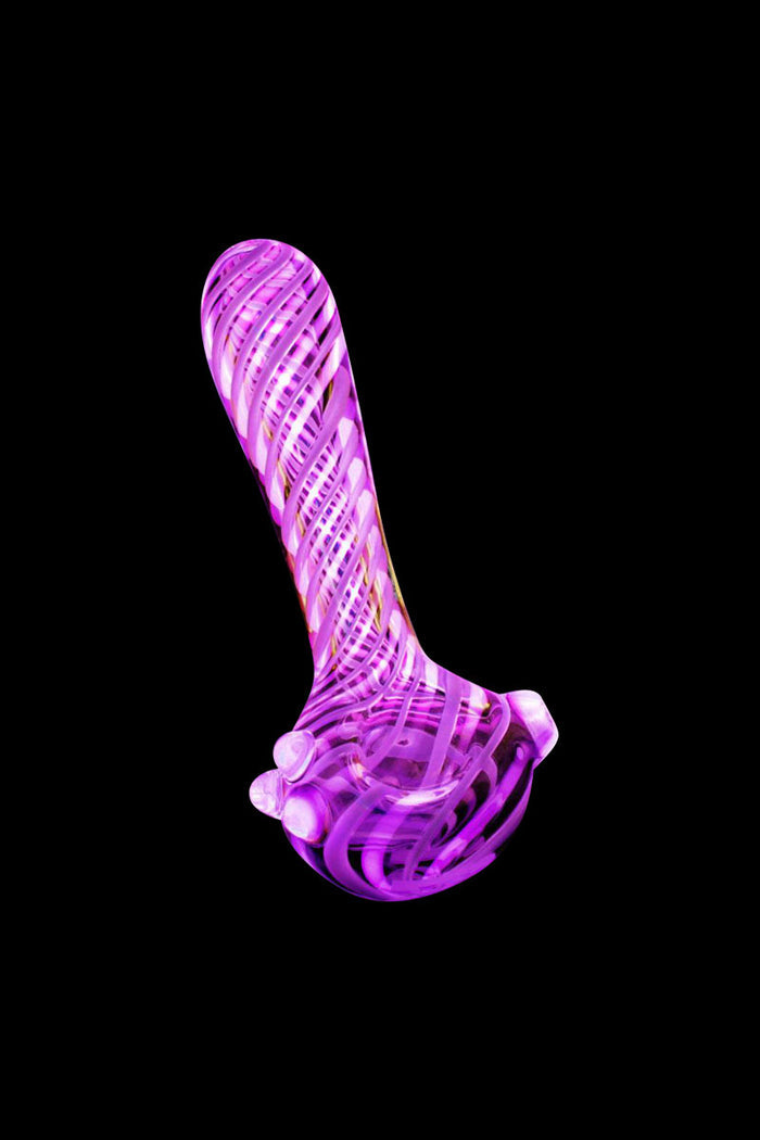 A studio shot of the Pulsar UV Candy Stripe Spoon Pipe, showcasing its colorful striped glass design from a slightly angled perspective.