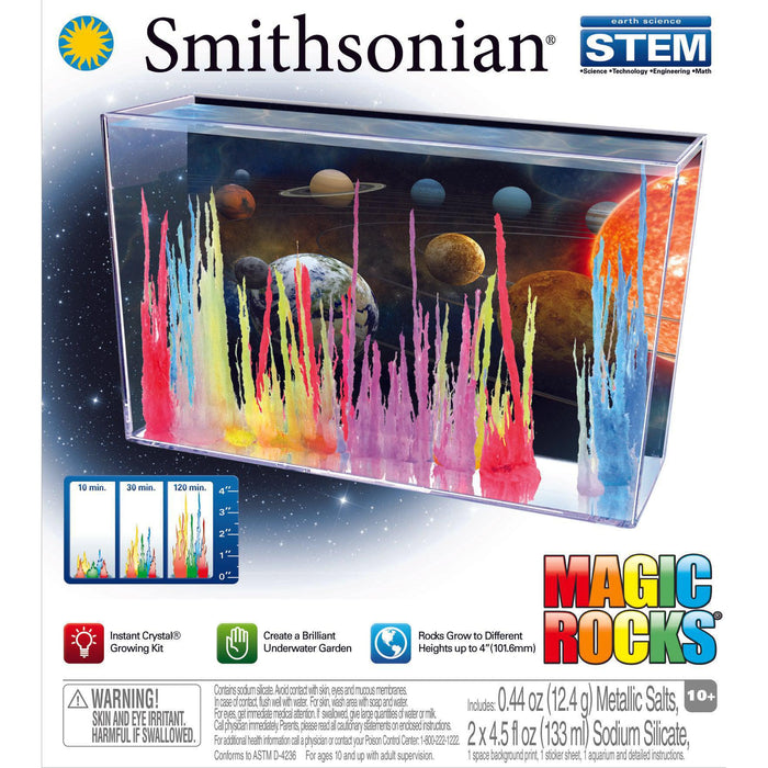 The Smithsonian Magic Rocks kit by Smithsonian features a clear tank with vibrant crystal spires and a chart showing growth at 10, 30, and 120 minutes. A fantasy planet background highlights this fun STEM experiment.