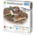 The Smithsonian Rock and Gem Dig by Smithsonian features excavation tools, safety goggles, colorful gemstones, and kit contents on the box. The packaging highlights its STEM educational benefits for ages 8+.