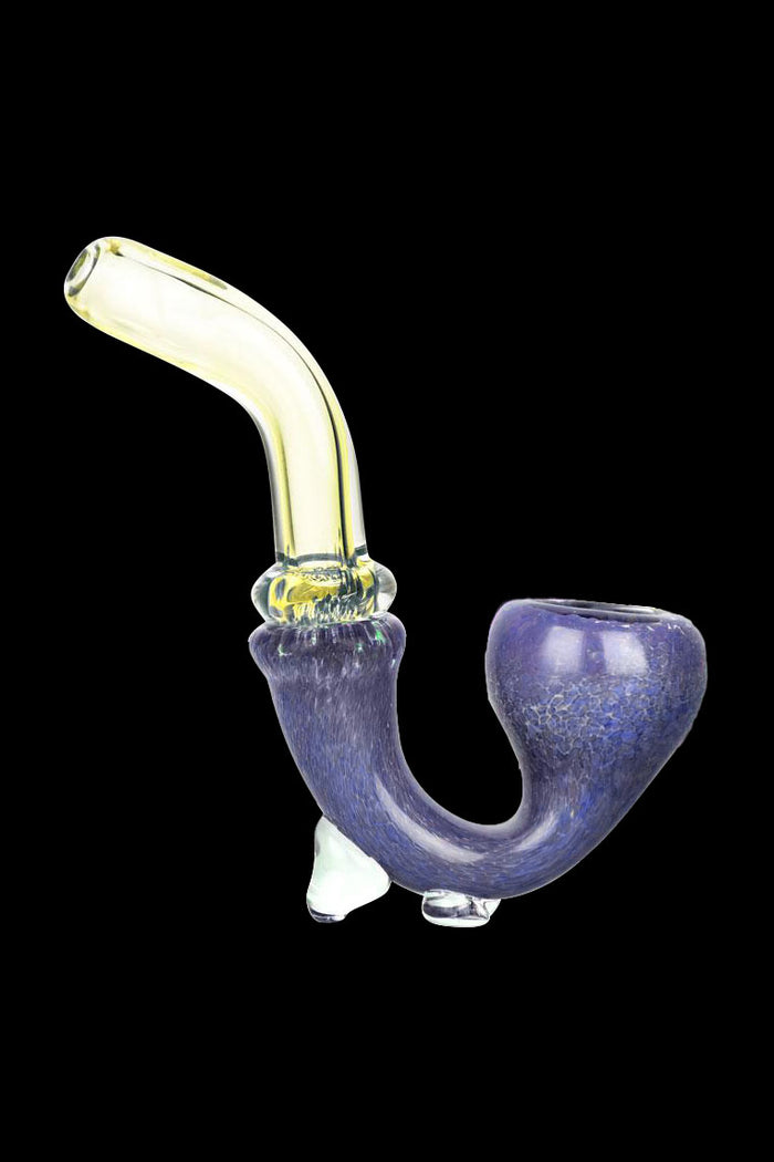 Purple and yellow glass pipe for smoking cannabis.