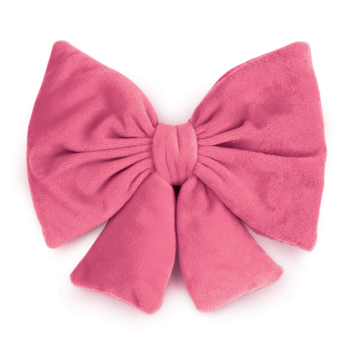Pink bow eye pillow on a white background