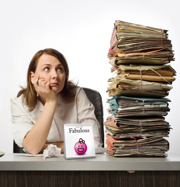 The Daily Mood desktop flip book showing multiple mood cards, a funny under-$20 office desk accessory and coworker gift