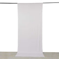 Plain white backdrop fabric for photography or display use.
