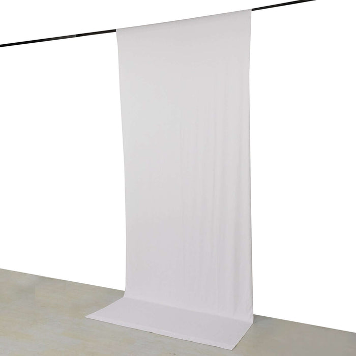 White backdrop fabric on a support stand for photography